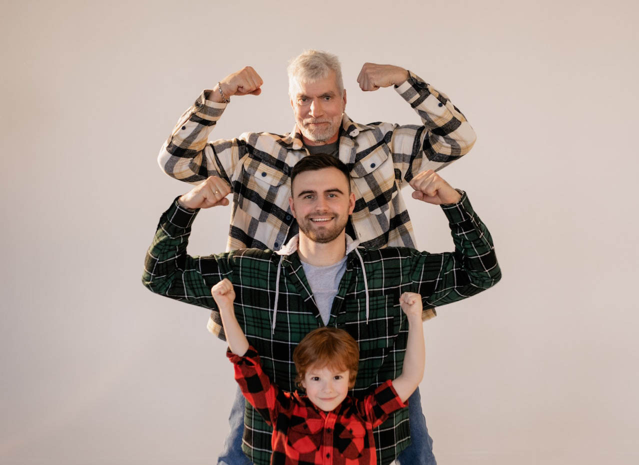 Grandfather, Son, Grandson flex their muscles